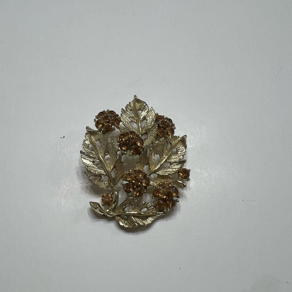 Gold Floral Brooch with Brown Accents